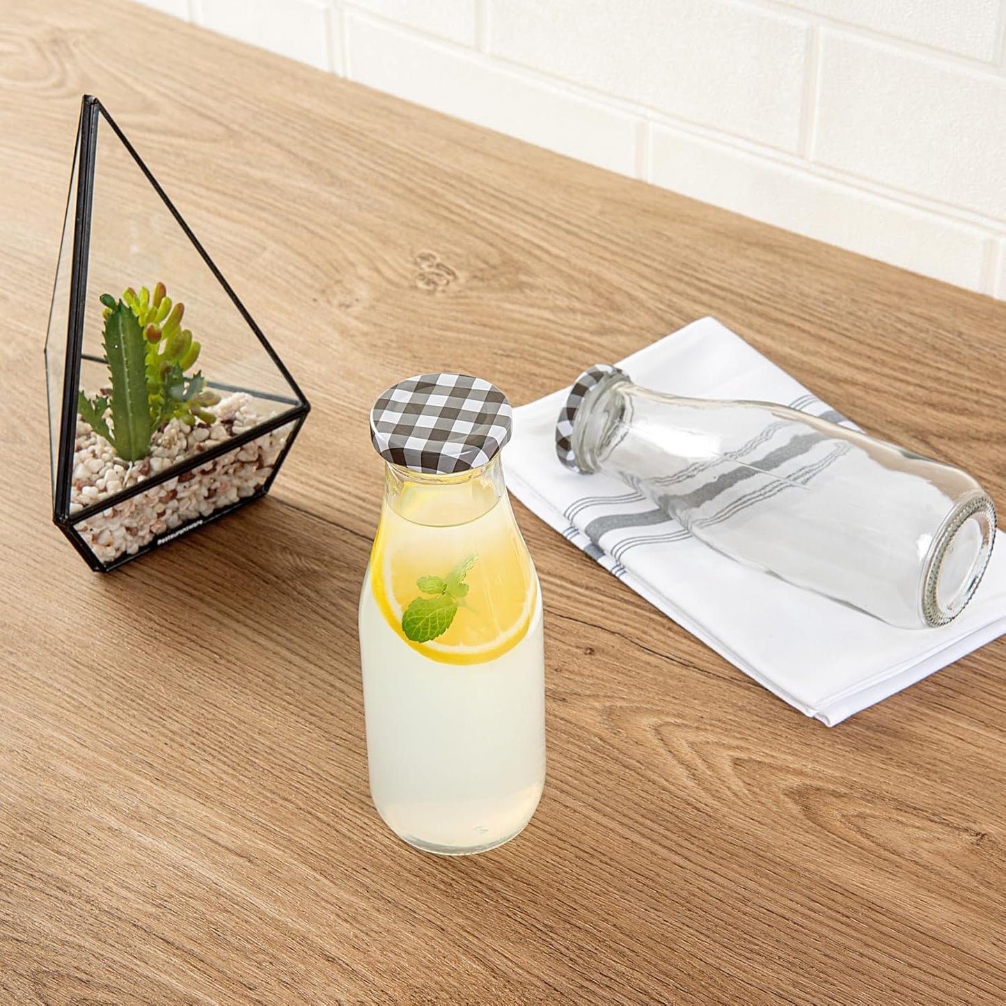 Restaurantware French Countryside 15 Ounce Glass Bottles 10 Durable Juice Bottles - With Black Plaid Lid Dishwashable Clear Glass Countryside Bottles For Hot And Cold Beverages