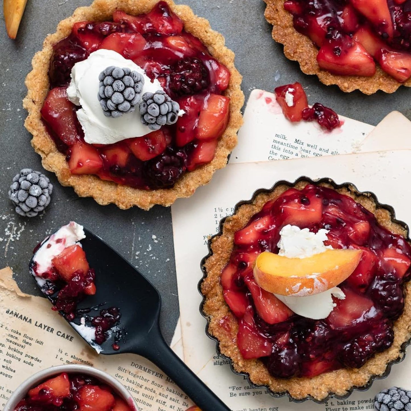 GIR: Get It Right Seamless Spoonula - Non-Stick Heat Resistant Silicone Scraper Spatula - Skinny Design for Mixing, Serving, Scraping, and Stirring - 11 In, Black